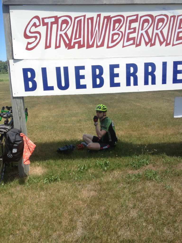 Richard eats blueberries in the only shade we can find.